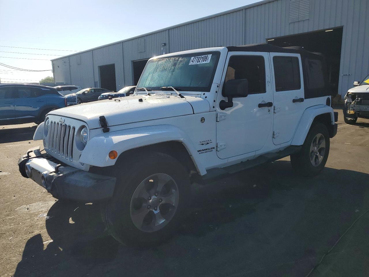 2017 Jeep Wrangler Unlimited Sahara, VIN 1C4BJWEG6HL629948 — Front end