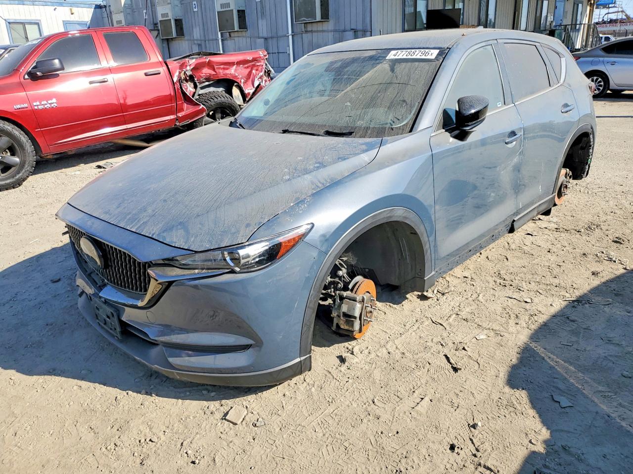 2021 Mazda CX-5 Touring, VIN JM3KFACM8M0319722 — Stripped