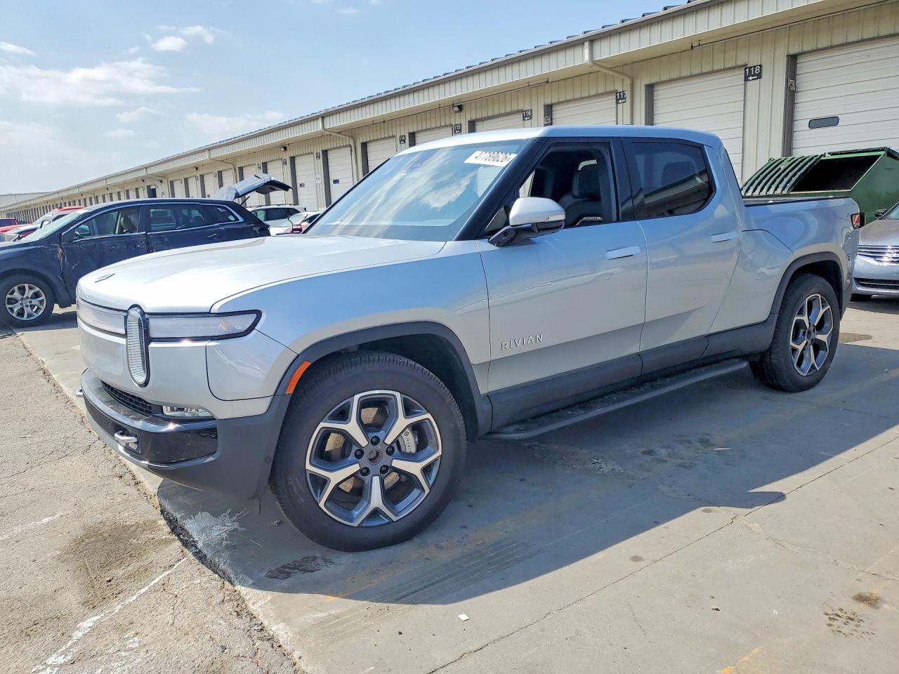 2023 Rivian R1T Adventure, VIN 7FCTGBAA9PN025045 — Side