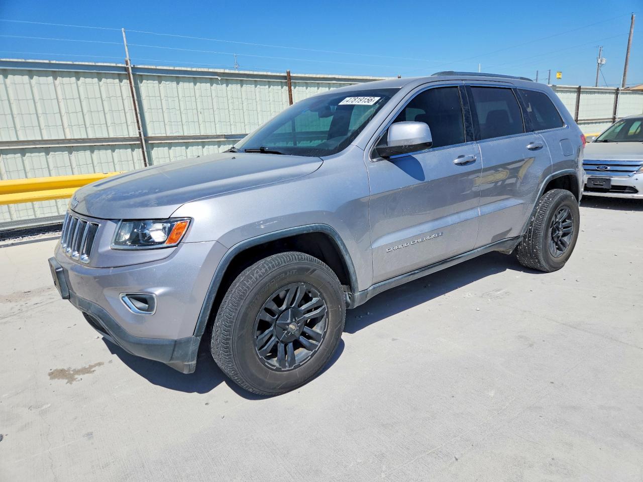 2014 Jeep Grand Cherokee Laredo, VIN 1C4RJEAG5EC151046 — Зад
