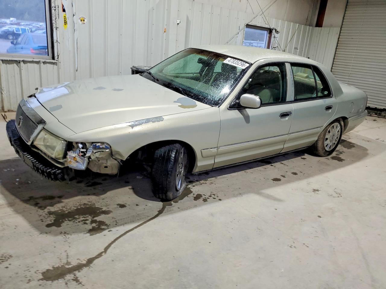 2005 Mercury Grand Marquis GS, VIN 2MEFM74W55X617262 — Rollover