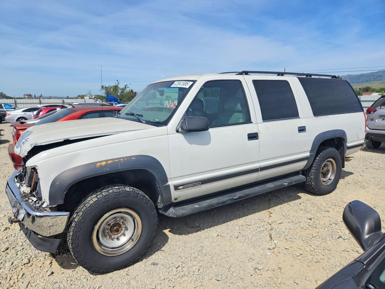 1997 Chevrolet Suburban, VIN 1GNGK26JXVJ325221 — Front end