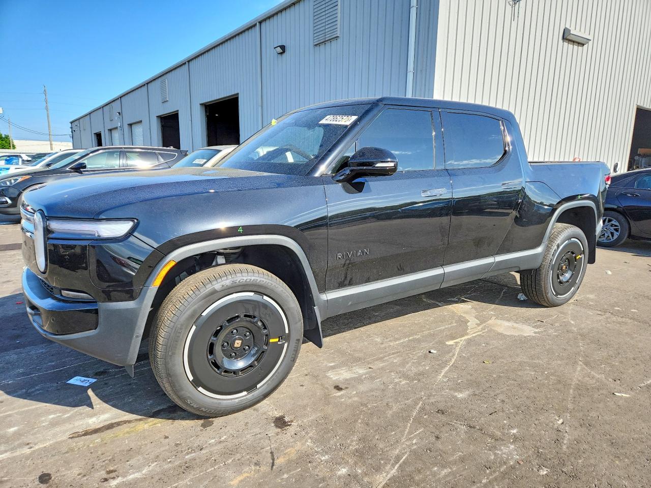 2025 Rivian R1T Adventure, VIN 7FCTGBAA5SN034916 — Side