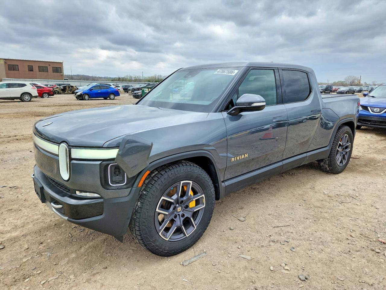 2022 Rivian R1T Adventure, VIN 7FCTGAAA2NN016713 — Hail