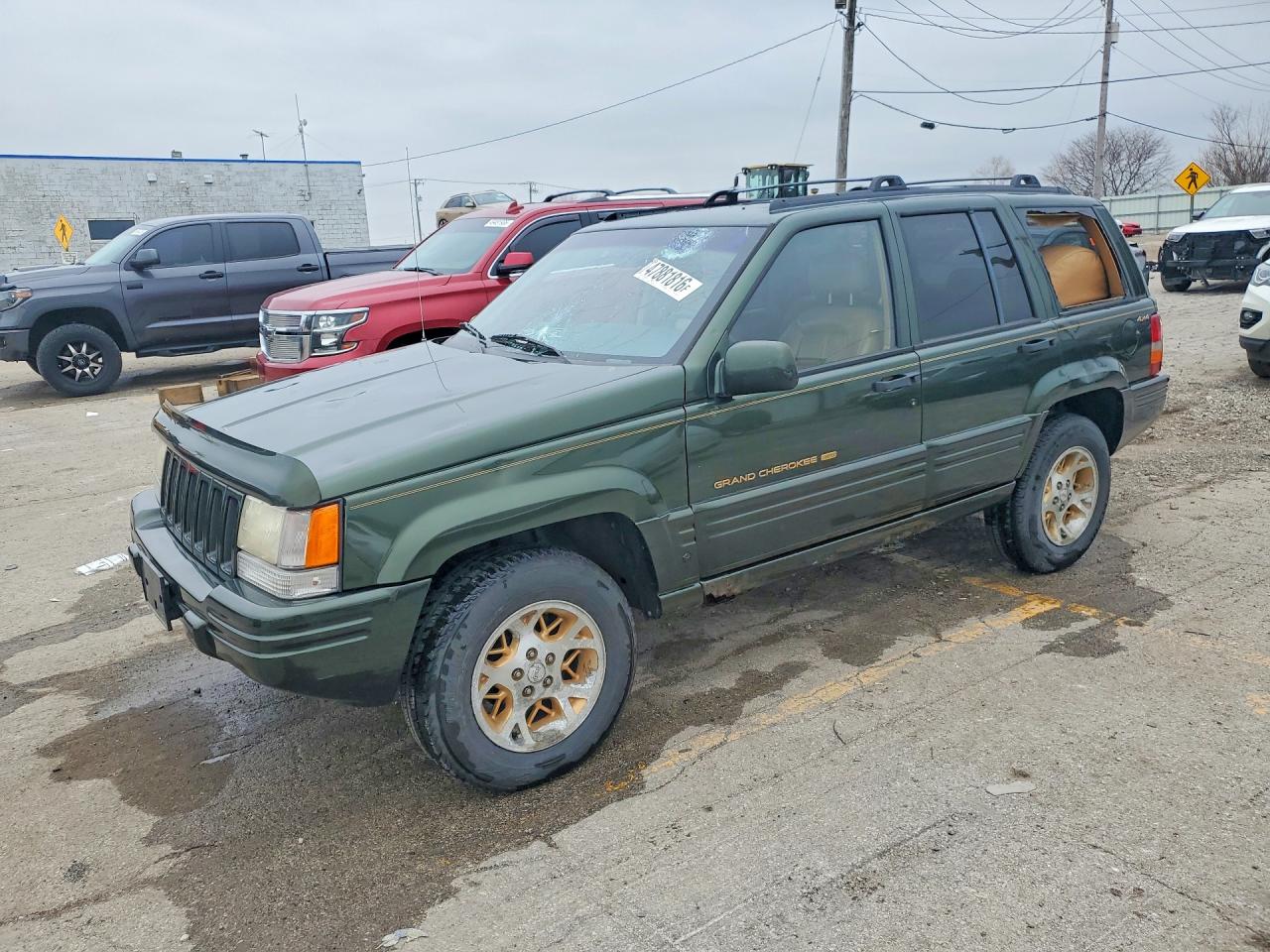 1997 Jeep Grand Cherokee Limited, VIN 1J4GZ78YXVC563693 — Hail