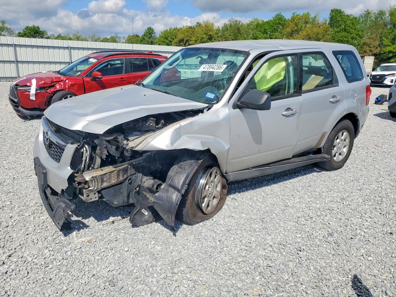 2009 Mazda Tribute Sport, VIN 4F2CZ02769KM09344 — Перед