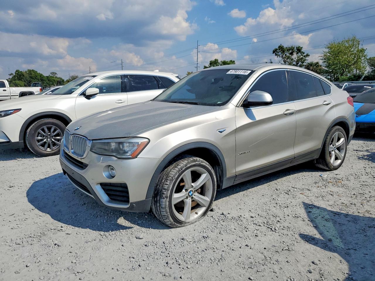 2015 BMW X4 xDrive28i, VIN 5UXXW3C53F0M89149 — Перед