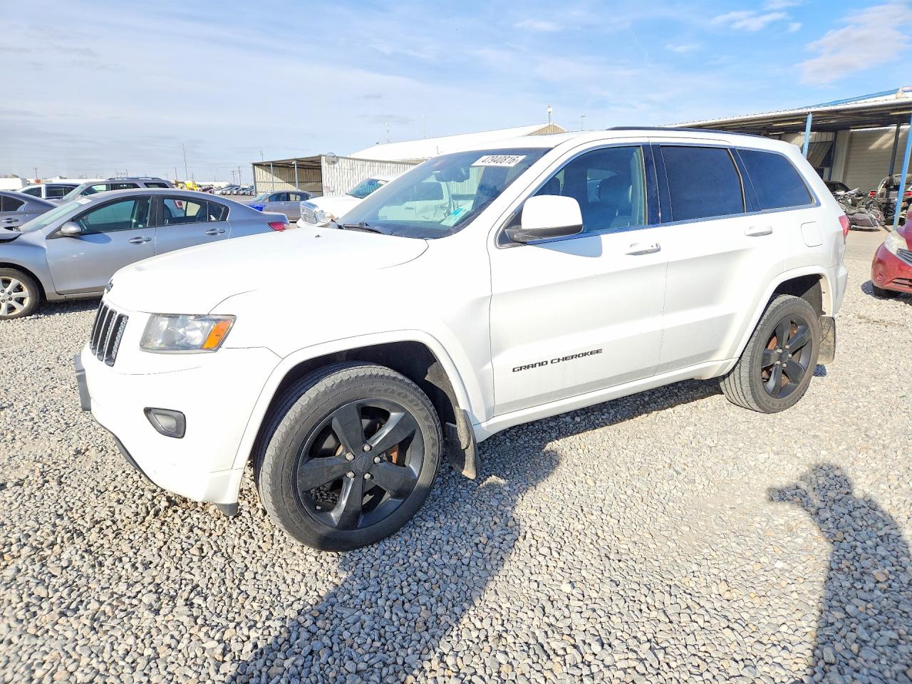 2015 Jeep Grand Cherokee Altitude, VIN 1C4RJFAG7FC803012 — Град