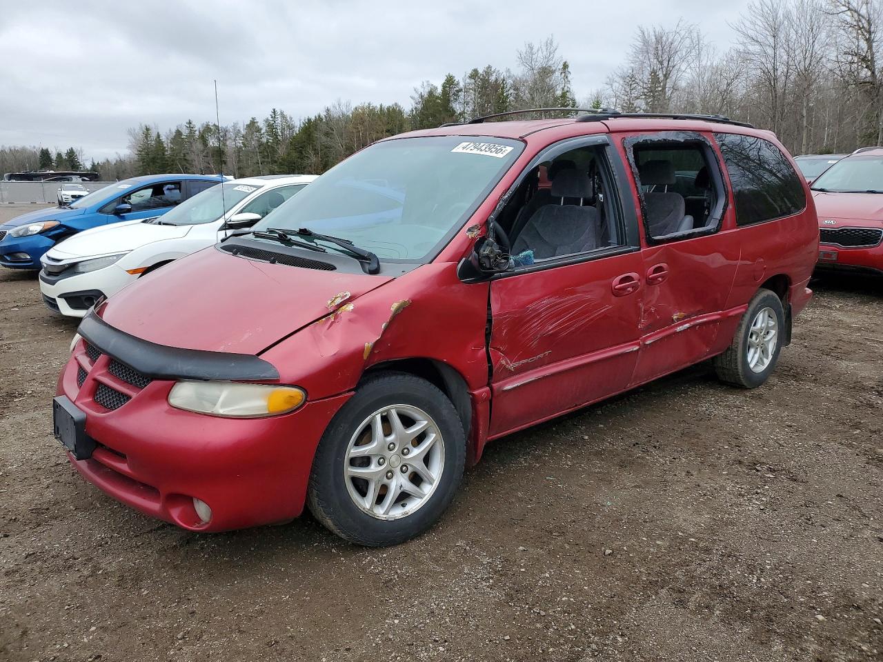 1999 Dodge Caravan SE, VIN 1B4GP44L2XB562368 — Бок