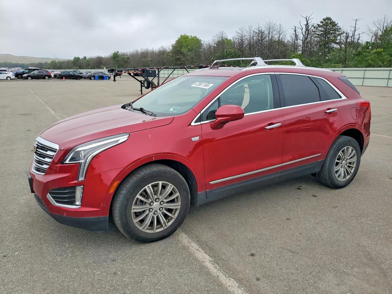 2019 Cadillac XT5 Luxury AWD, VIN 1GYKNDRS6KZ190594 — Side
