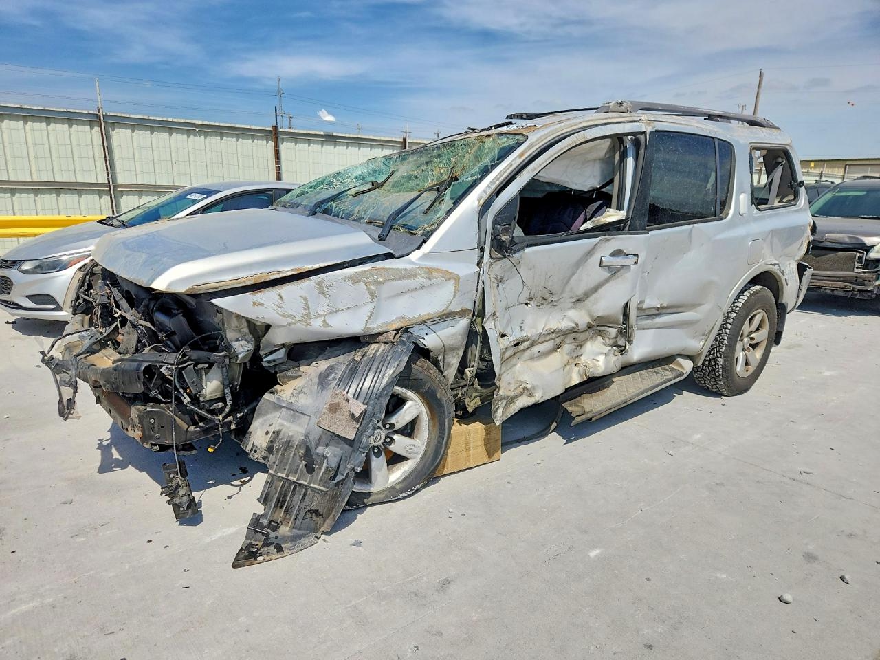 2011 Nissan Armada Platinum, VIN 5N1AA0NC4BN614944 — Rollover