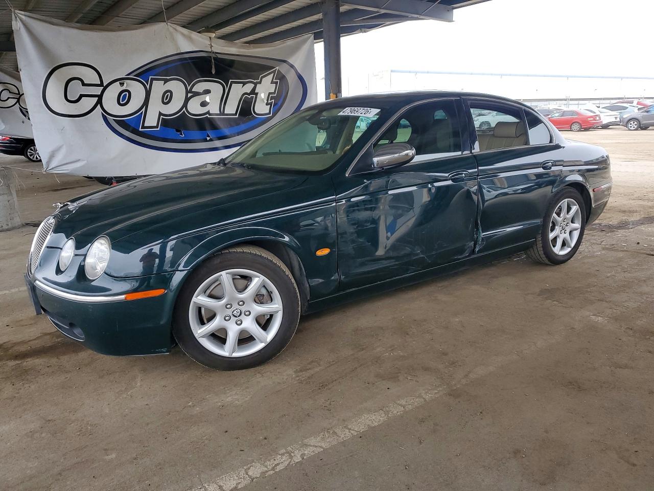 2007 Jaguar S-Type 4.2, VIN SAJWA01BX7HN79566 — Side
