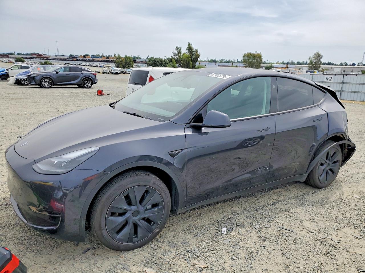 2024 Tesla Model Y, VIN 7SAYGDED9RF122312 — Rear end