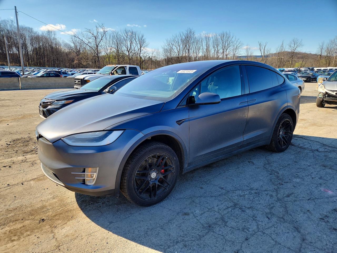 2019 Tesla Model X P100D, VIN 5YJXCAE47KF154359 — Side