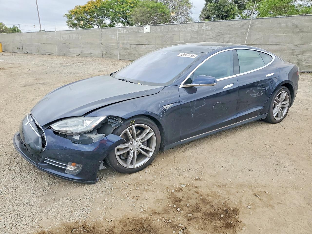 2014 Tesla Model S 60, VIN 5YJSA1H18EFP56161 — Vandalism