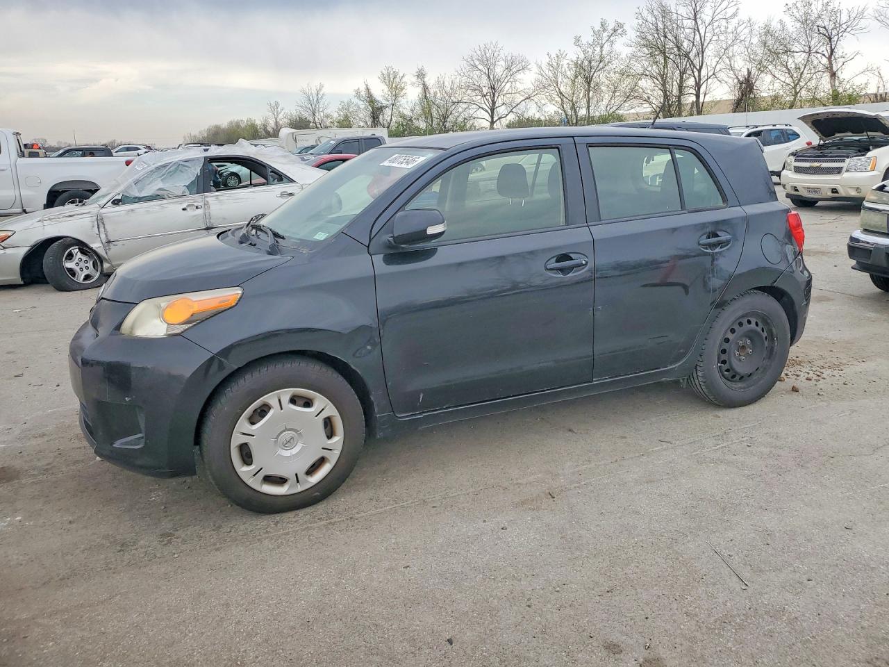 2014 Scion xD, VIN JTKKUPB44E1045328 — Бок