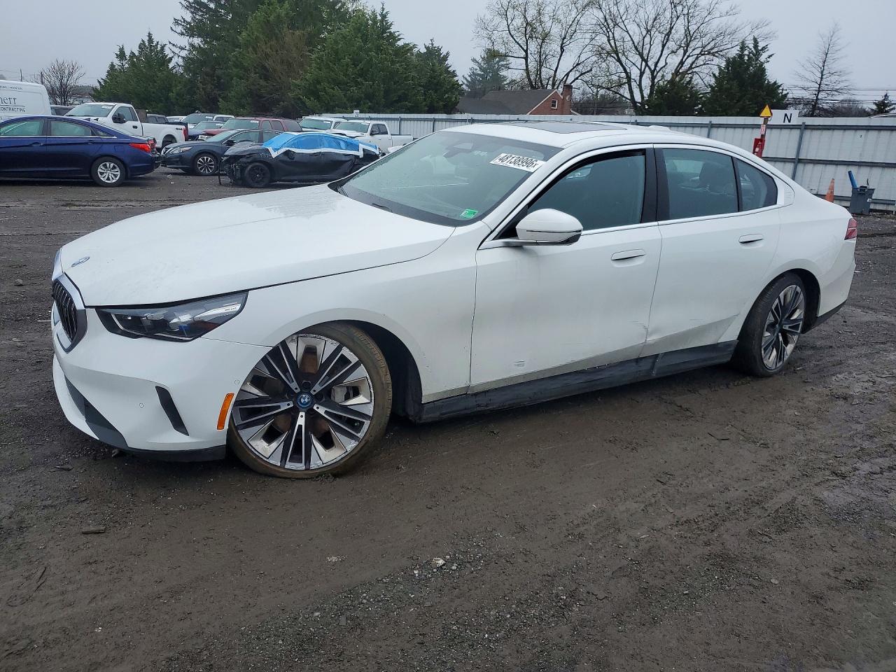 2025 BMW i5 xDrive40, VIN WBY13HG0XSCS24103 — Side