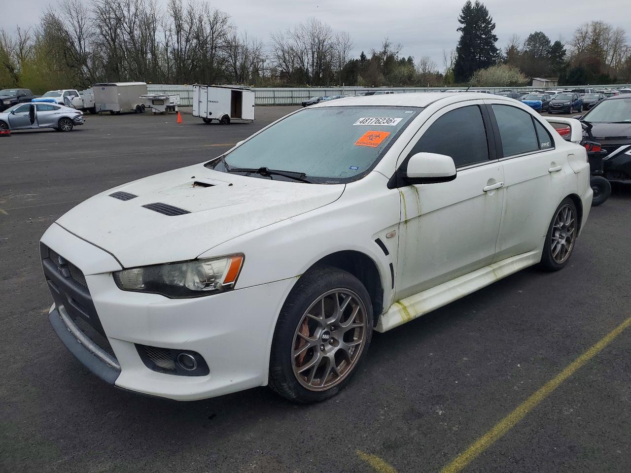2010 Mitsubishi Lancer Evolution MR, VIN JA32W5FV1AU020449 — Vandalism