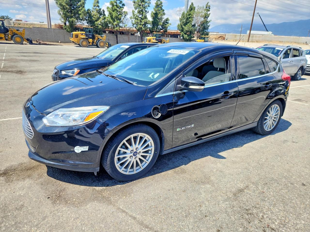 2014 Ford Focus Electric, VIN 1FADP3R45EL311844 — Minor dents and scratches