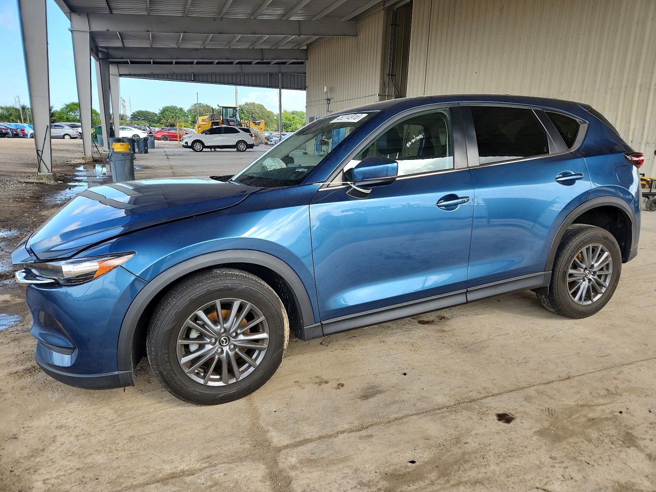 2021 Mazda CX-5 Touring, VIN JM3KFBCM1M0447693 — Front end