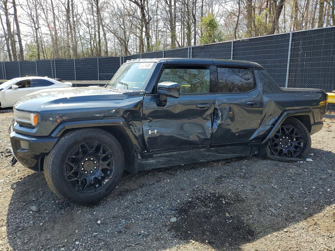 2025 GMC HUMMER EV Pickup 2X, VIN 1GT40BDD6SU111061 — Side