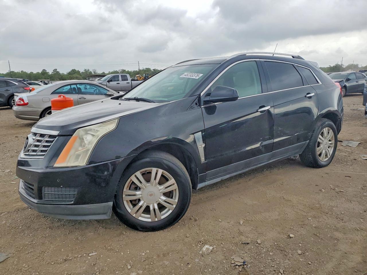 2014 Cadillac SRX Luxury Collection, VIN 3GYFNBE39ES657366 — Бок