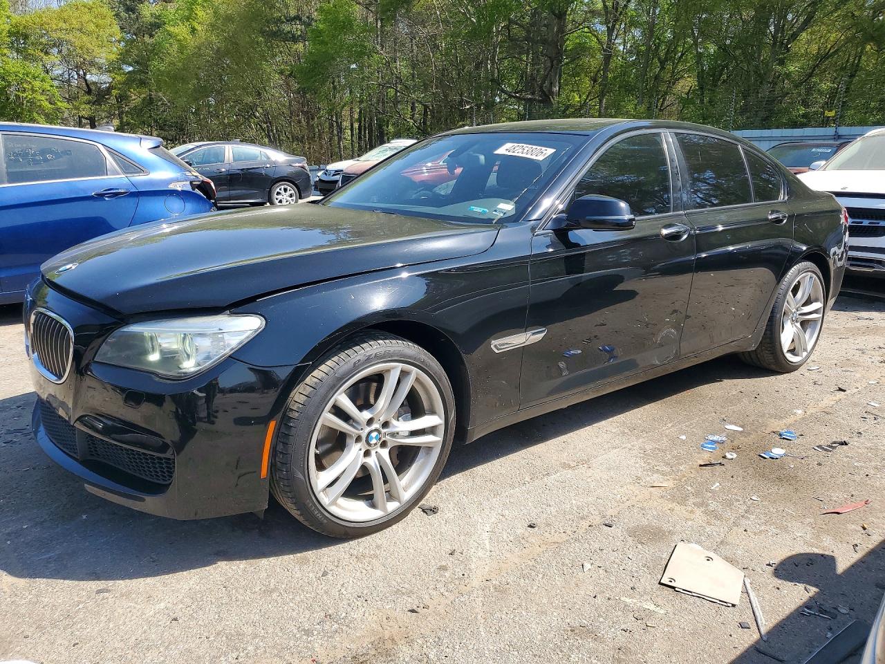 2013 BMW 7 Series 740i, VIN WBAYA6C54DD143846 — Side