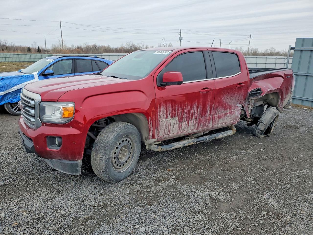2018 GMC Canyon 4WD SLE, VIN 1GTG6CEN7J1306045 — Side