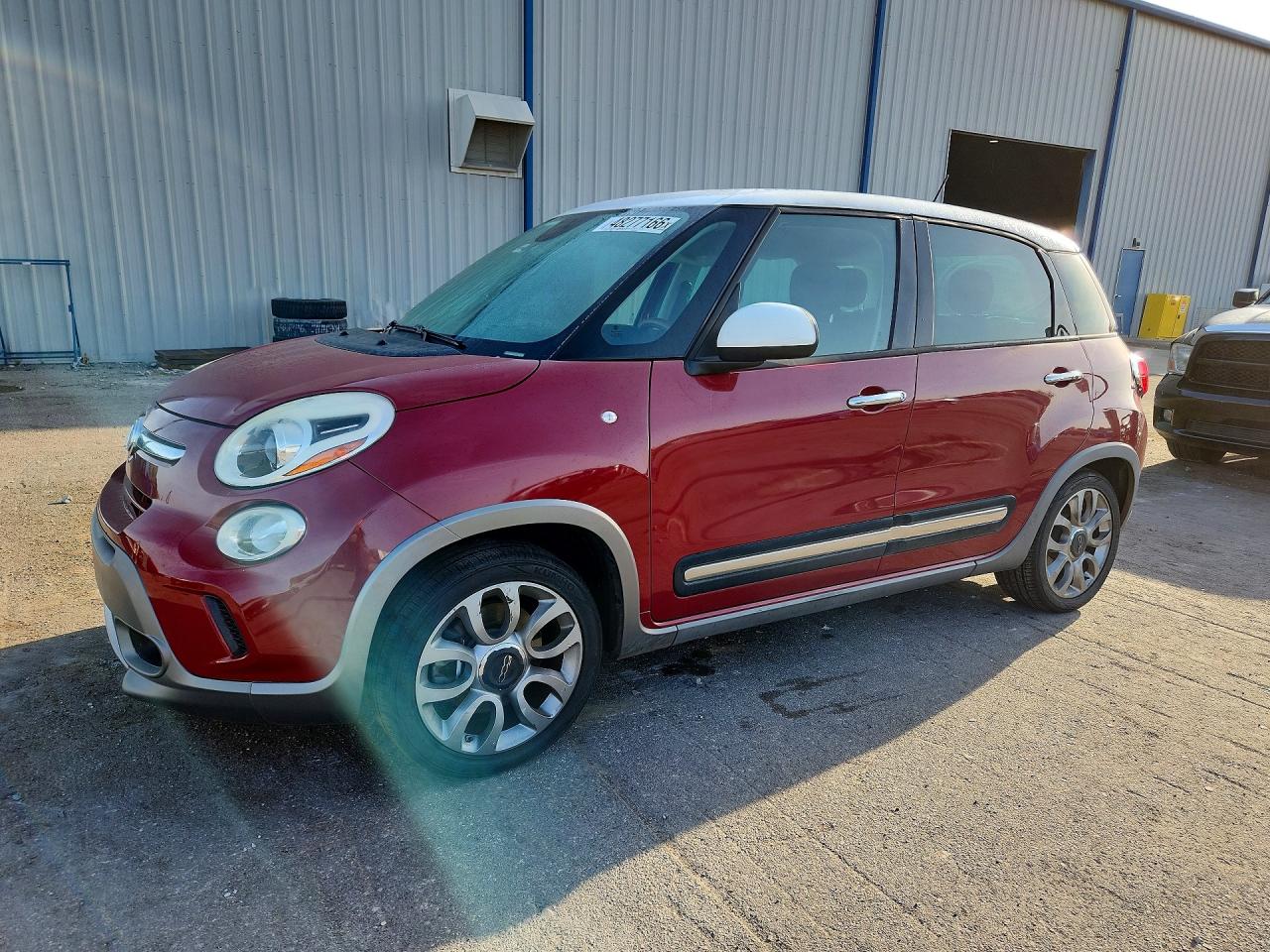 2015 FIAT 500L Urbana Trekking, VIN ZFBCFADH2FZ031548 — Rear end