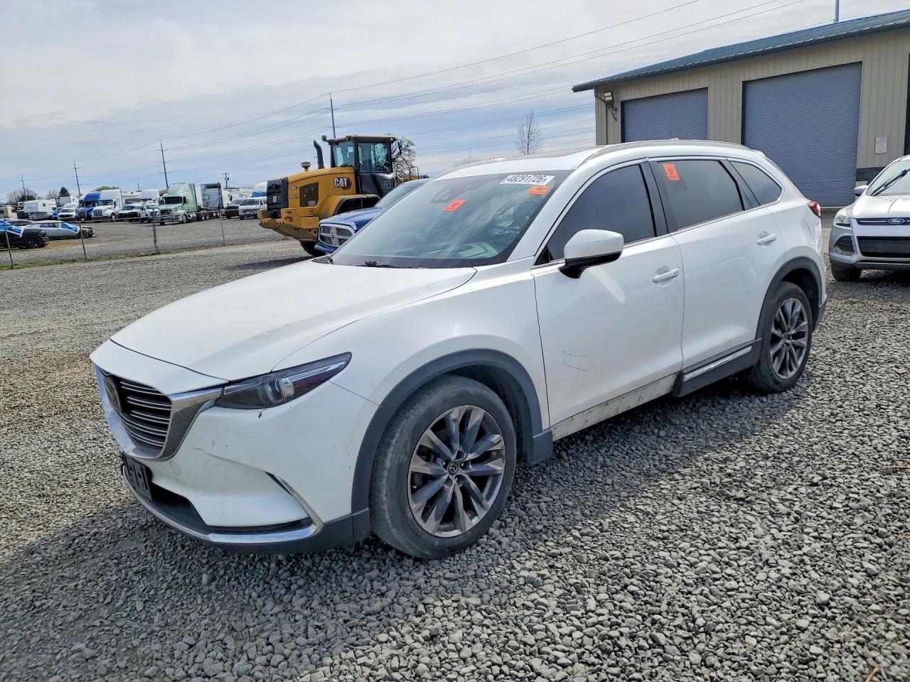 2016 Mazda CX-9 Grand Touring, VIN JM3TCBDY9G0116637 — Front end