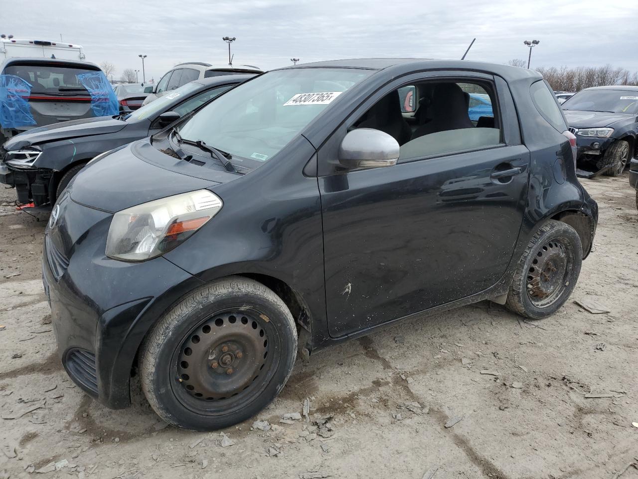 2014 Scion iQ, VIN JTNJJXB04EJ029974 — Side