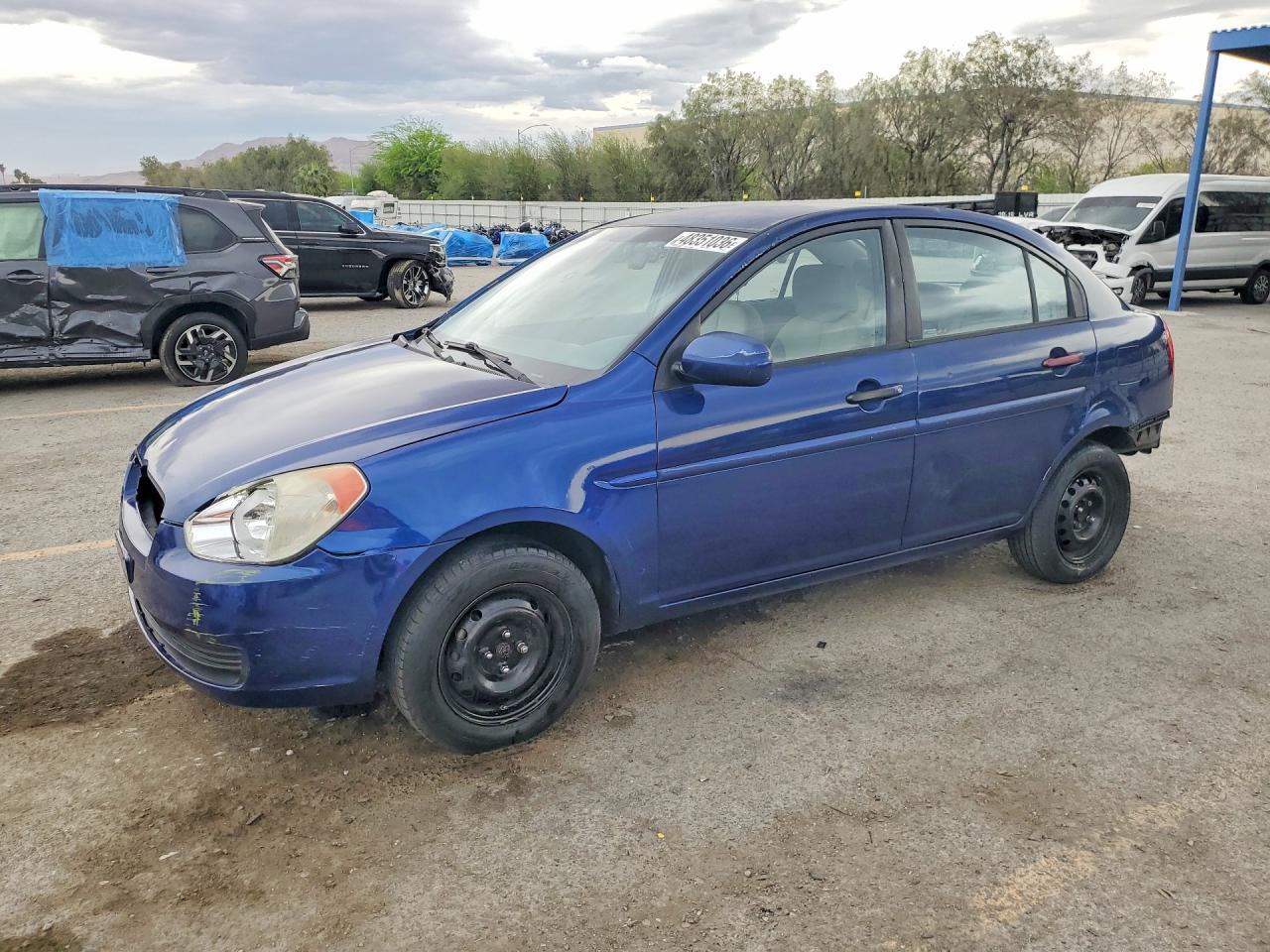 2010 Hyundai Accent GLS, VIN KMHCN4AC5AU492772 — Side