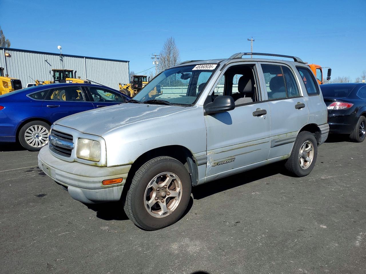 1999 Chevrolet Tracker, VIN 2CNBJ13C6X6920276 — Side