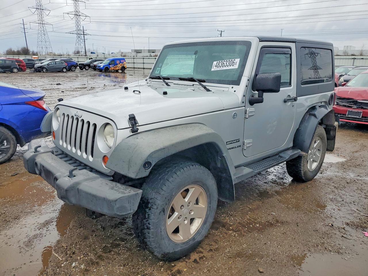 2012 Jeep Wrangler Sport, VIN 1C4AJWAG7CL143904 — Rear end