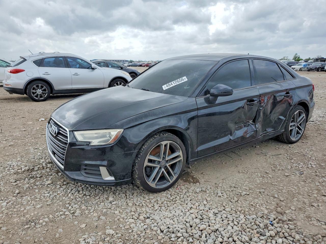 2019 Audi A3 Premium, VIN WAUBEGFF9K1016576 — Side