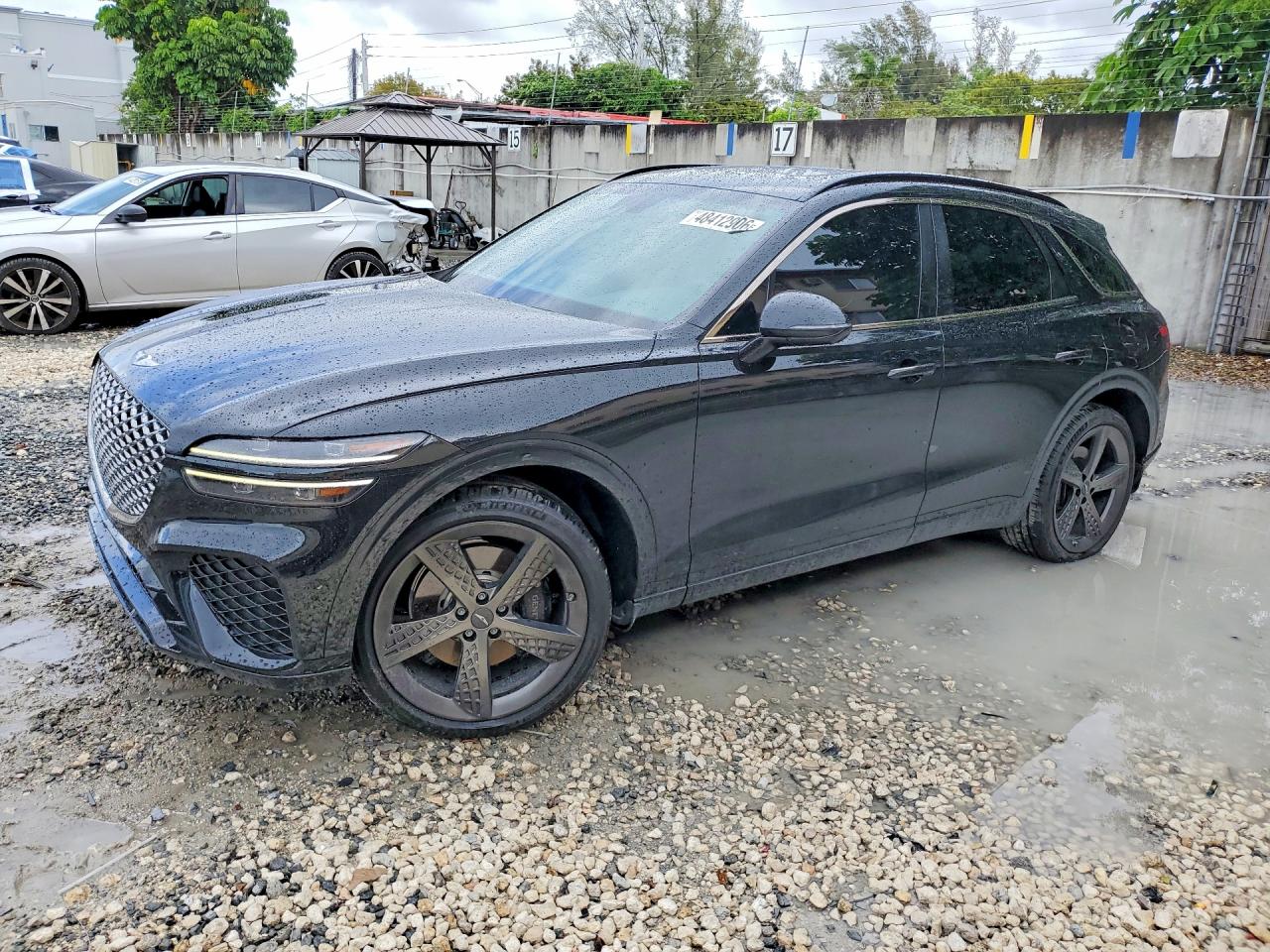 2023 Genesis GV70 2.5T, VIN KMUMADTB5PU100579 — Side
