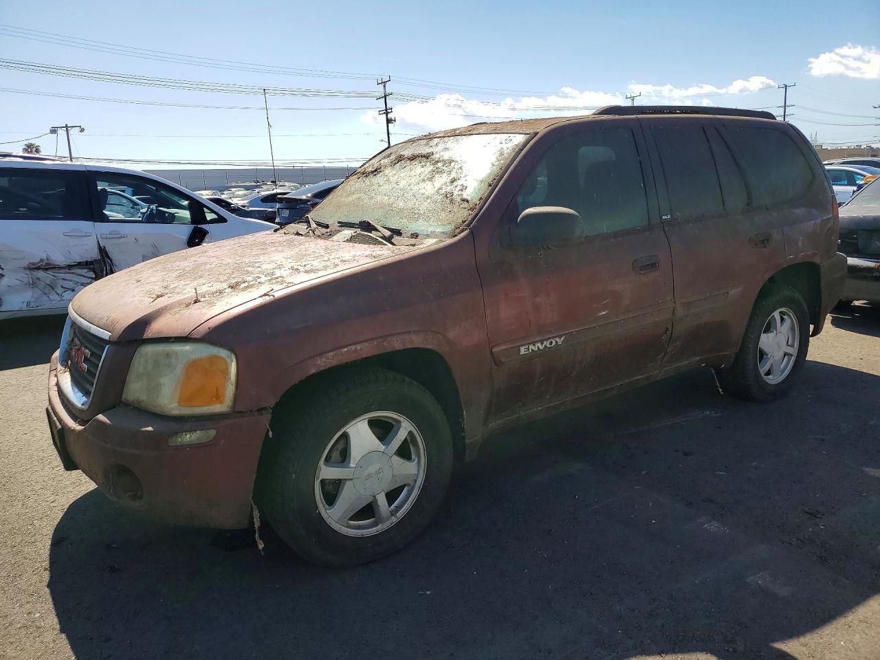 2003 GMC Envoy SLT, VIN 1GKDS13S232175393 — Minor dents and scratches