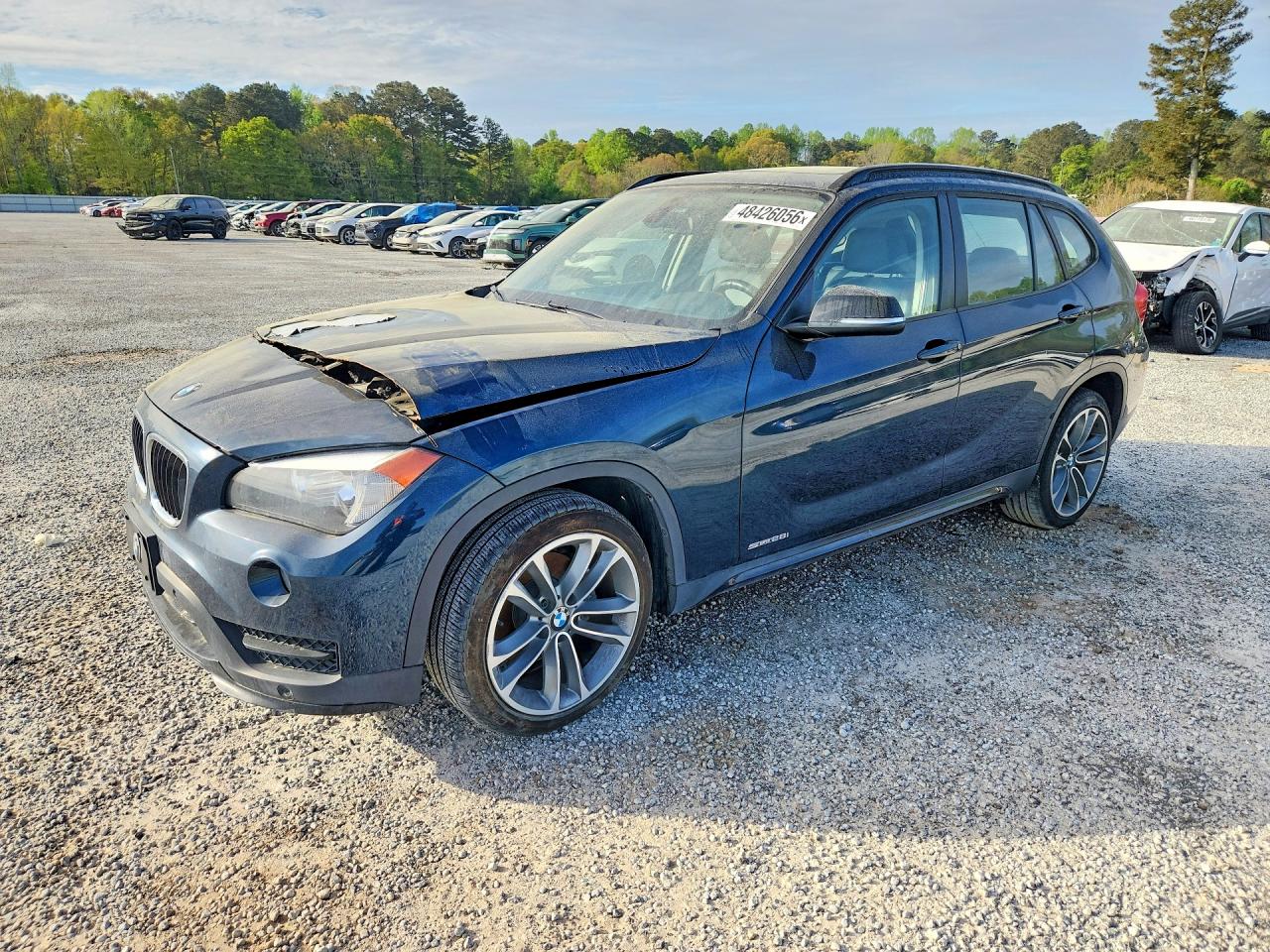 2015 BMW X1 sDrive28i, VIN WBAVM1C51FVW57017 — Engine fire