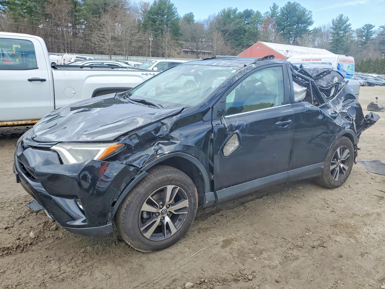 2018 Toyota RAV4 XLE, VIN 2T3RFREVXJW721874 — Rollover