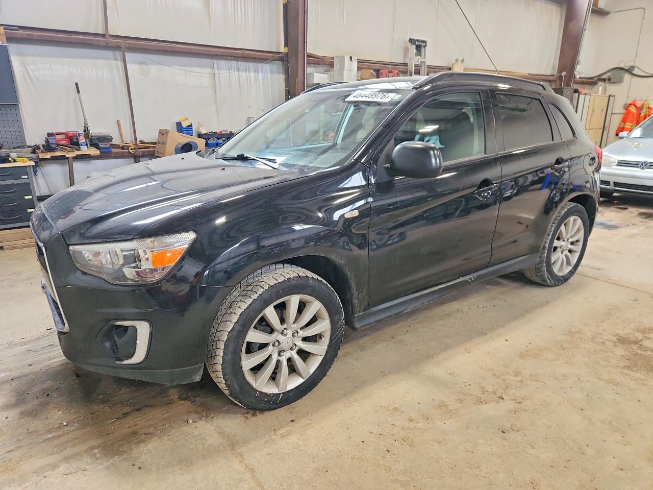 2015 Mitsubishi Outlander Sport SE, VIN 4A4AJ4AUXFE602483 — Minor dents and scratches
