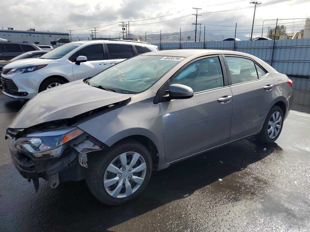 2015 Toyota Corolla L, VIN 5YFBURHE7FP248648 — Front end