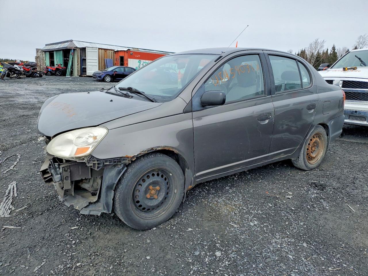 2003 Toyota ECHO, VIN JTDBT123330297962 — Перед
