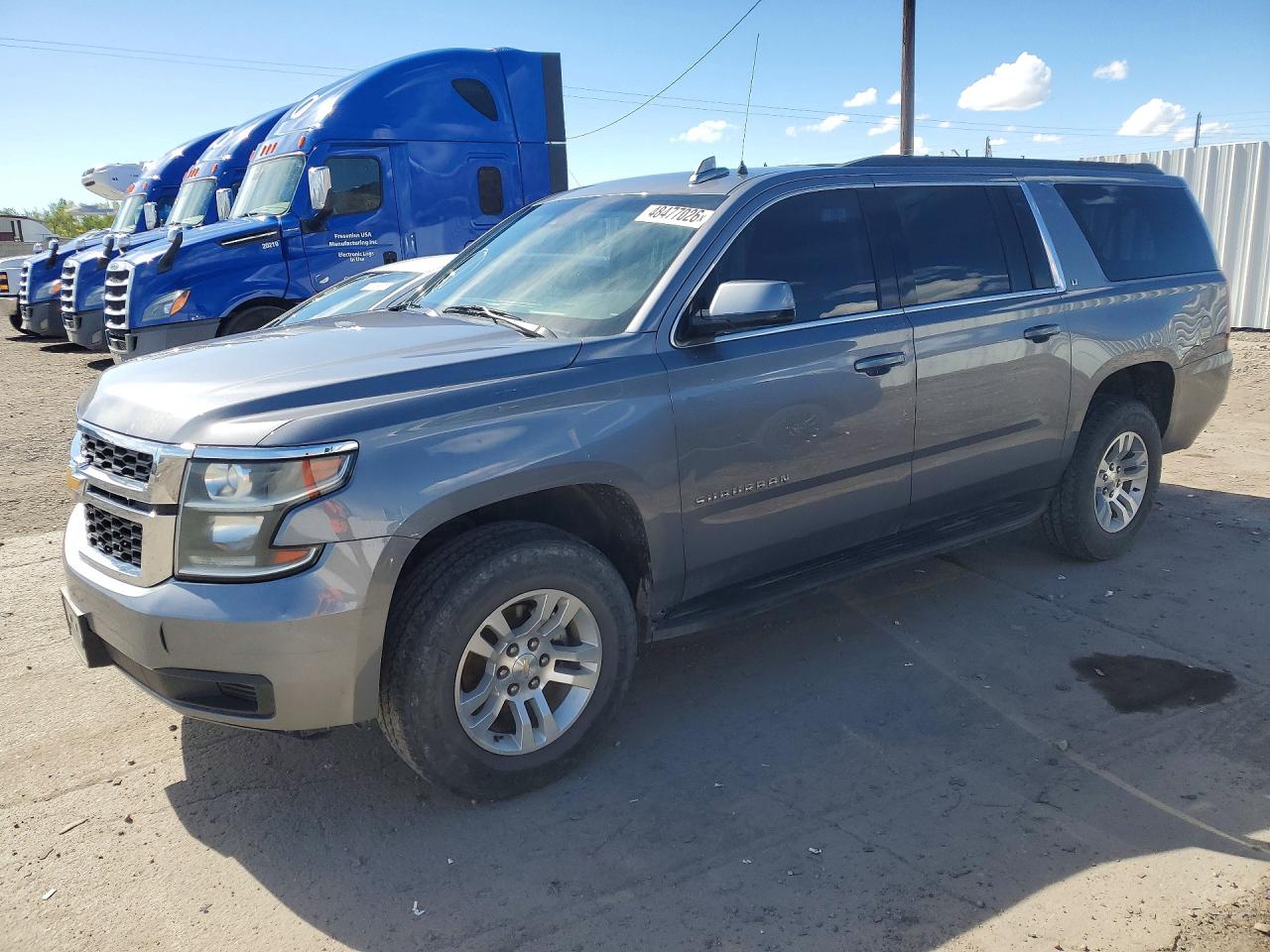 2018 Chevrolet Suburban LT, VIN 1GNSKHKC9JR329695 — Rear end