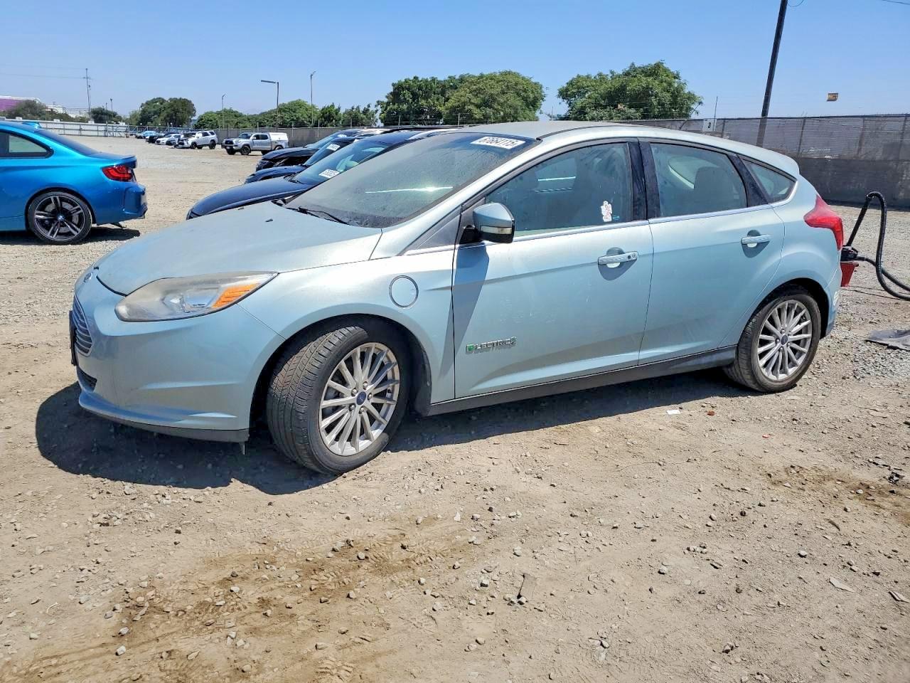 2014 Ford Focus Electric, VIN 1FADP3R44EL281770 — Side