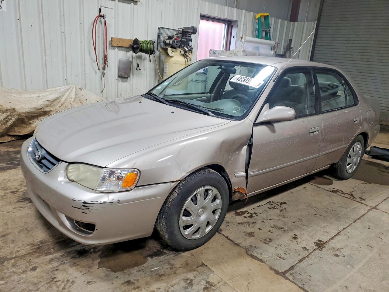 2002 Toyota Corolla LE, VIN 1NXBR12E12Z640156 — Vandalism