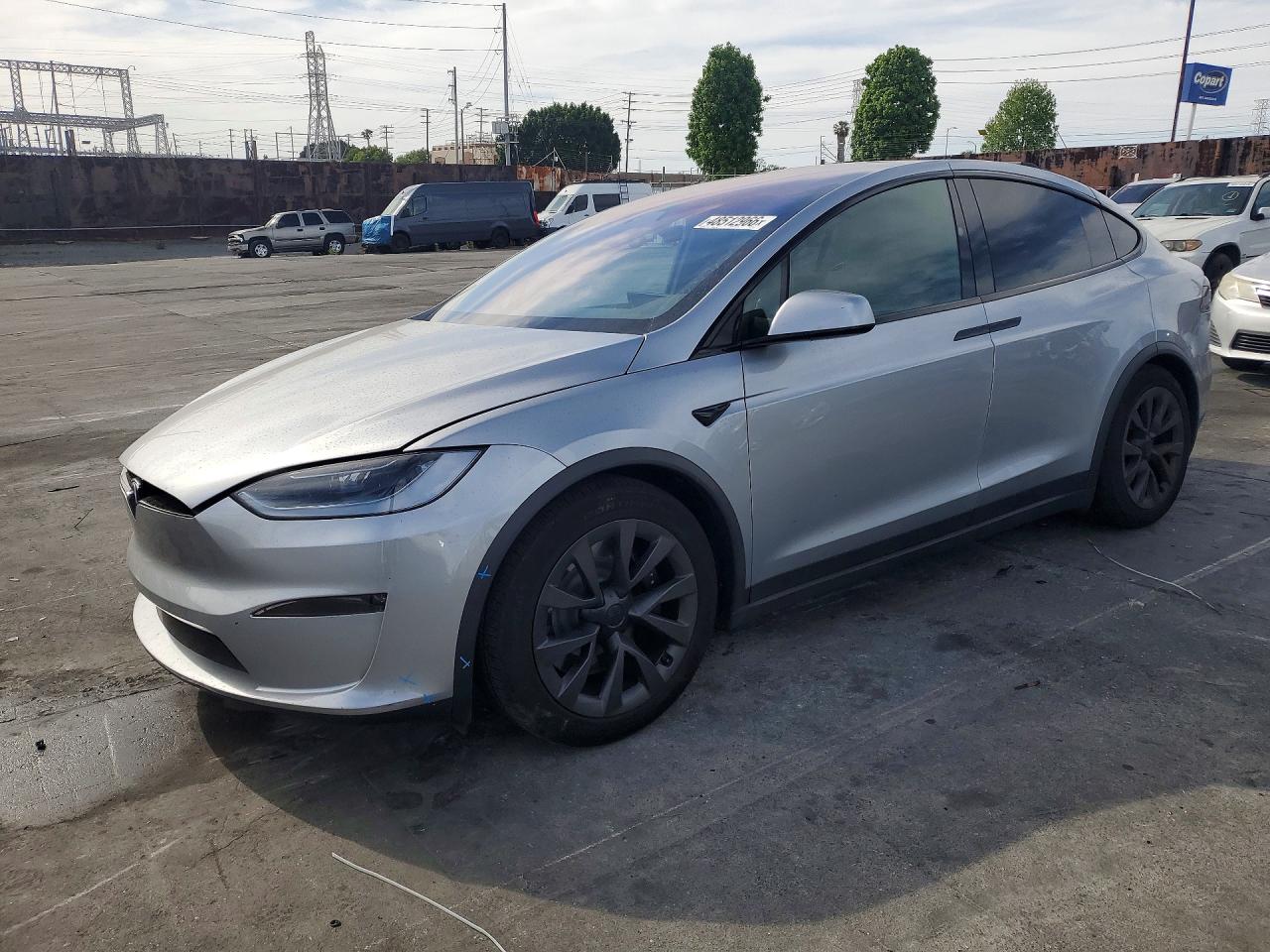 2024 Tesla Model X, VIN 7SAXCDE55RF458345 — Side