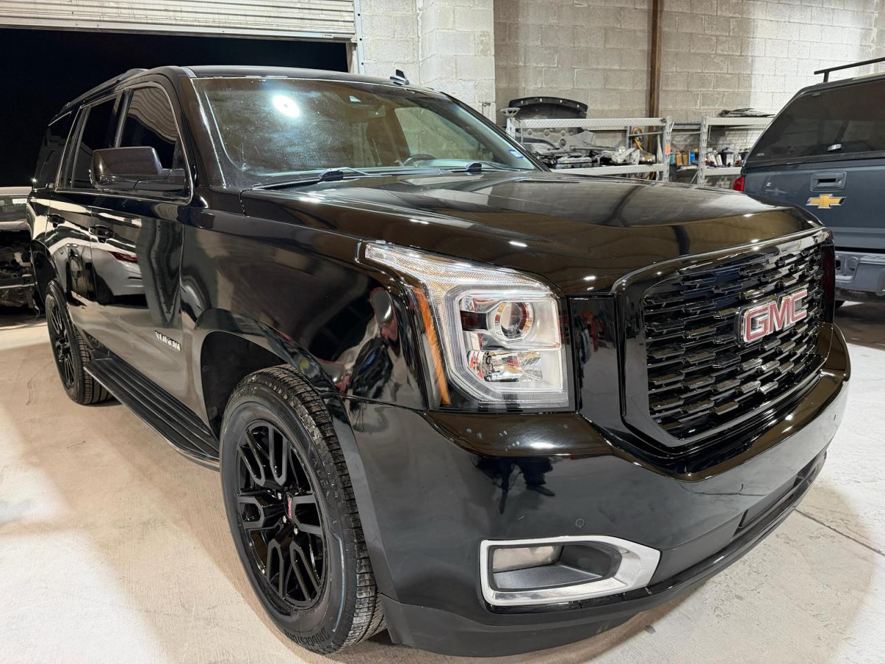 2015 GMC Yukon SLT, VIN 1GKS2BKC1FR144526 — Prior damage history