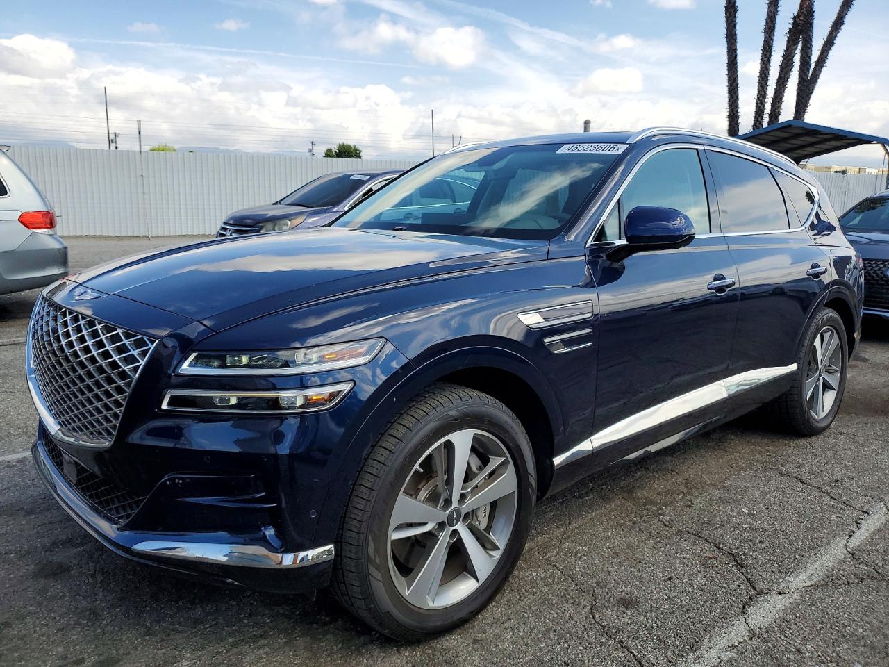 2023 Genesis GV80, VIN KMUHCESC4PU119457 — Side