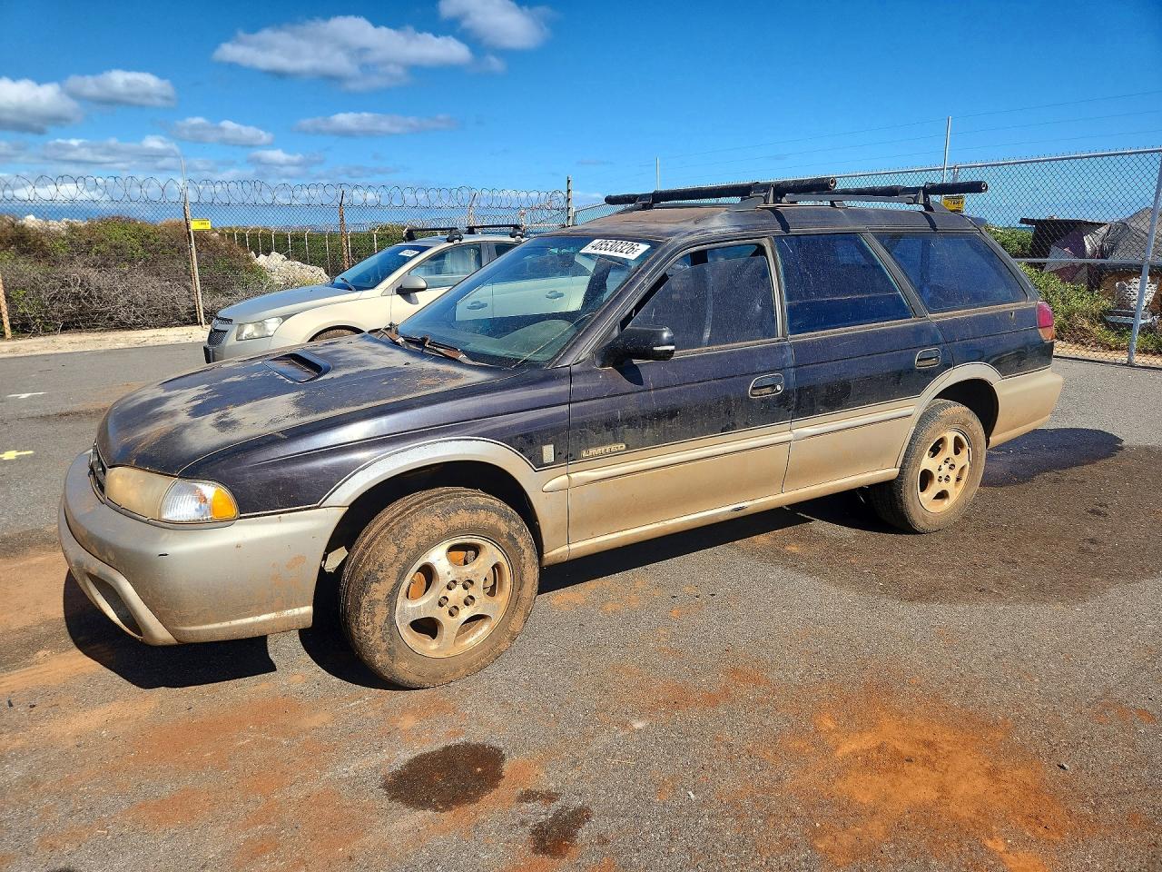 1998 Subaru Legacy Outback, VIN 4S3BG6859W7644488 — Вода / потоп