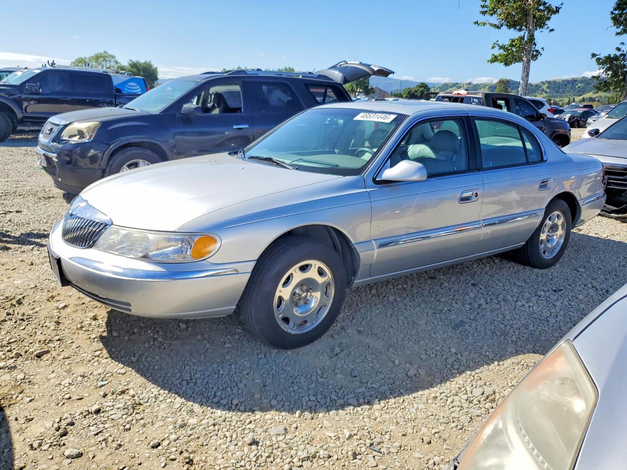 1999 Lincoln Continental, VIN 1LNHM97V4XY705033 — Вандализм